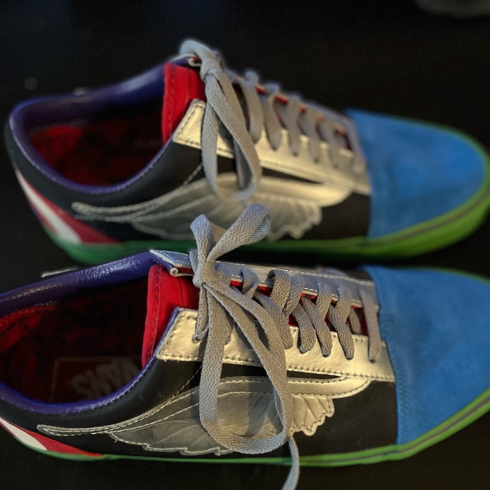 Mens size 10.5, Women’s Size 12 Marvel Avengers Vans